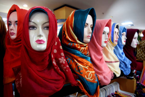 istock Hijabs for sale on boutique display 1393041241