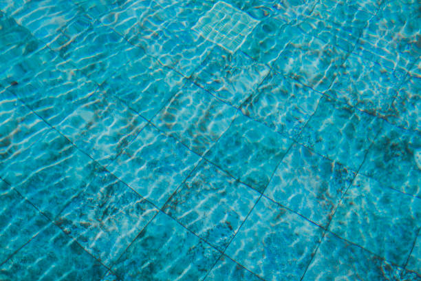 Swimming Pool Surface With Light Reflection and Water Ripple Patterns 1