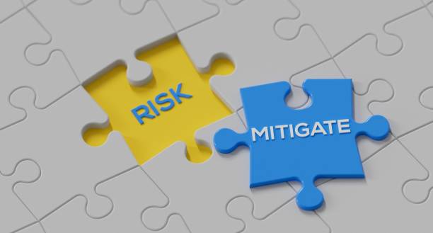 istock Mitigate word on a puzzle piece about to fill in a hole marked Risk to illustrate finding missing information to complete mitigation or risk 1393054908