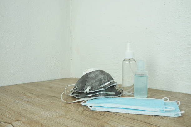 istock Surgical Mask with alcohol gel and spray 1393058162