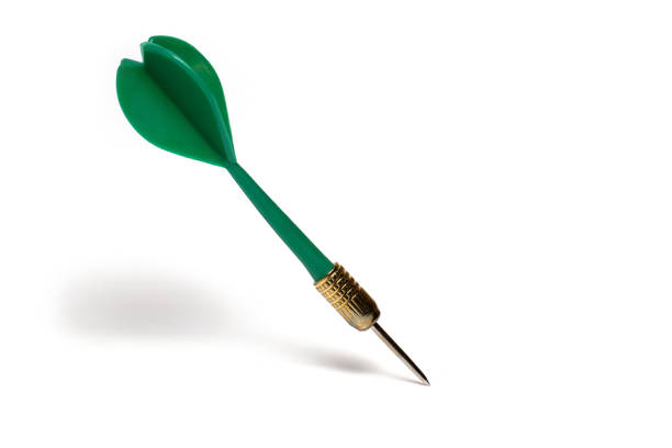 istock Closeup green dart arrow tip white background 1393058403