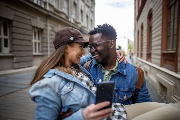 istock Couple taking pictures 1393063390