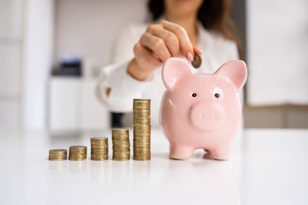 istock Piggybank Money And Support Hand 1393065817