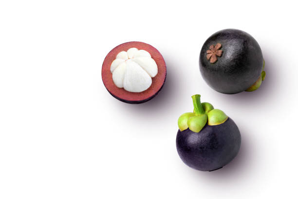Mangosteen fruit with cut in half sliced isolated on white