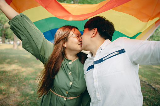 Lesbian Couple with Rainbow Flag