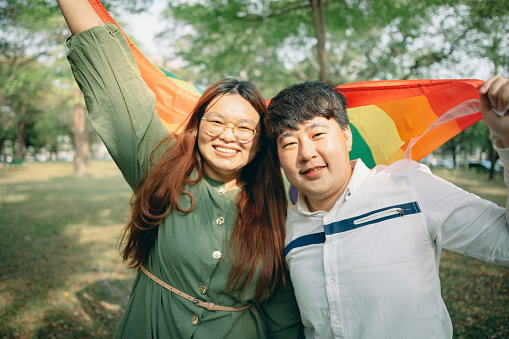 Lesbian Couple with Rainbow Flag