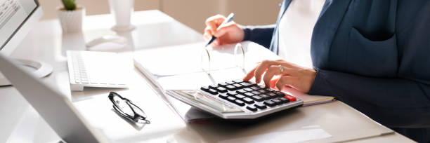 istock Accountant Calculating Budget And Tax 1393066709