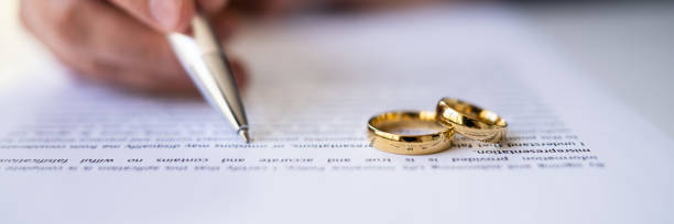 istock Divorce Settlement With Rings. Parties Agree 1393066918
