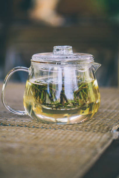 istock The teapot is placed on the mat. 1393072054