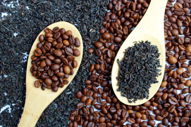 istock Tea and coffee are on wooden spoons. 1393074727