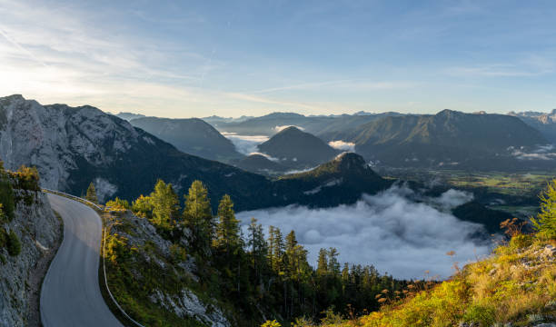 istock Fog over valley seen from above in the mountains 1393077146