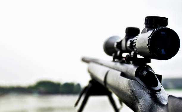 Rifle with a scope and bipod Rifle with a scope and bipod with first person shooter (FPS) view tripod attack stock pictures, royalty-free photos & images
