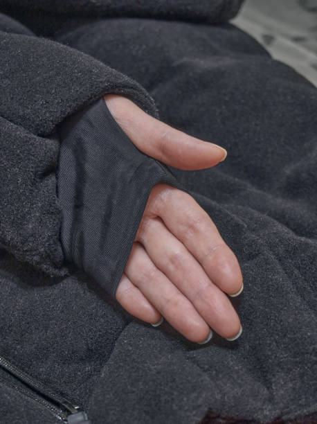 istock Black close-up jacket, sleeve with cuff on the arm. Soft selective selective focus 1393083937