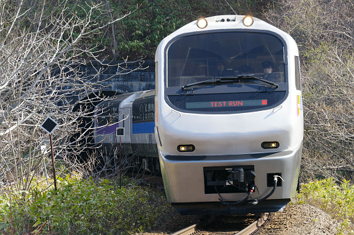 Otaru-city, Hokkaido, Japan - April 22, 2022 : Test run “North Rainbow Express” coming through the tunnel