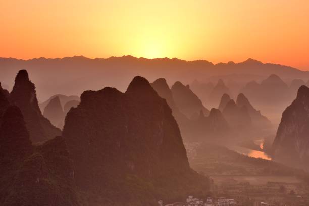 istock Magnificent sunrise-dawn over Lijiang River and peaks 1393087381