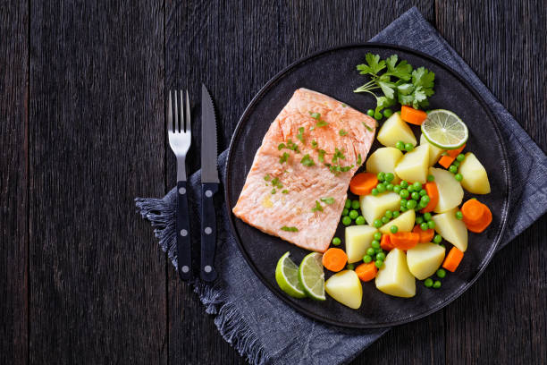 istock Multi Cooker salmon, carrots, peas and potatoes 1393087515
