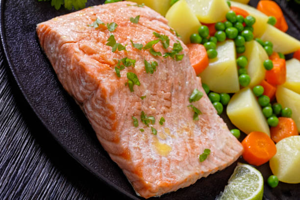 istock Multi Cooker salmon, carrots, peas and potatoes 1393087575