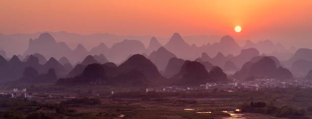 istock Karst landscape with peaks and sunset 1393087692