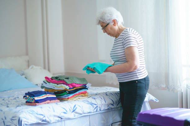 istock Senior Retirement Woman preparing for a vacation 1393089892