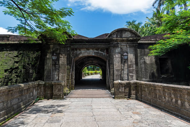 istock Drawbridge at Puerta Real Gardens in Intramuros, Manila, Philippines 1393090595