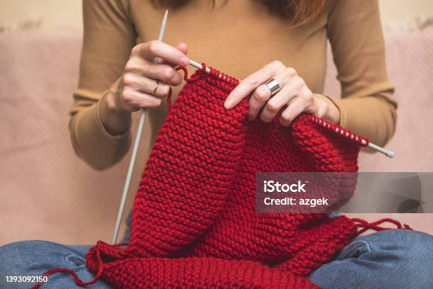 Girl Knits A Scarf Stock Photo - Download Image Now - Ball Of Wool, Hand, Knitting Needle