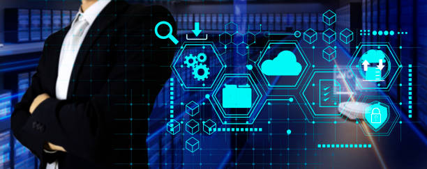 istock A businessman builds a large server room for cloud support.,Uses computer equipment for transmitting large amounts of data. 1393092574