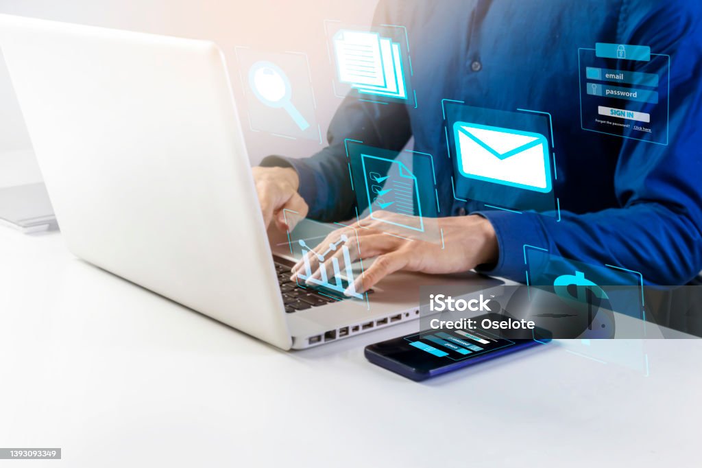 Businessman searching and verifying the correctness of document information.,Management of financial system management and customer information via email. Digital Authentication Stock Photo