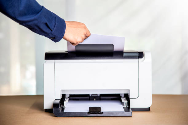 istock Printer, copier, scanner in office. Workplace ,photocopier machine for scanning document printing a sheet paper and xerox photocopy. 1393097423