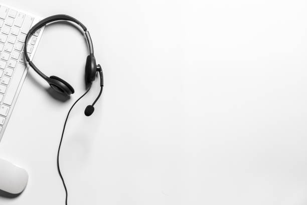 istock Headset and customer support equipment at call center ready for actively service , Communication support, call center and customer service help desk. for (call center) concept . 1393097431