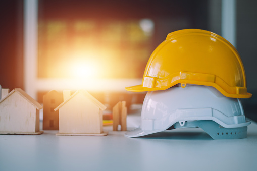 safety helmet hard hat for safety project of engineer workman on table office