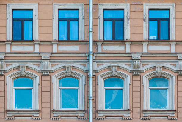 istock Windows in row on facade of historic building 1393099885