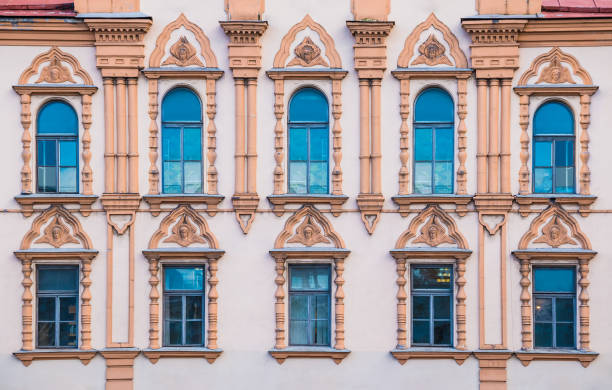 istock Windows in row on facade of historic building 1393100147
