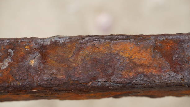 istock Rusty part of shipwreck. An iron piece from a ship on the seashore 1393101623