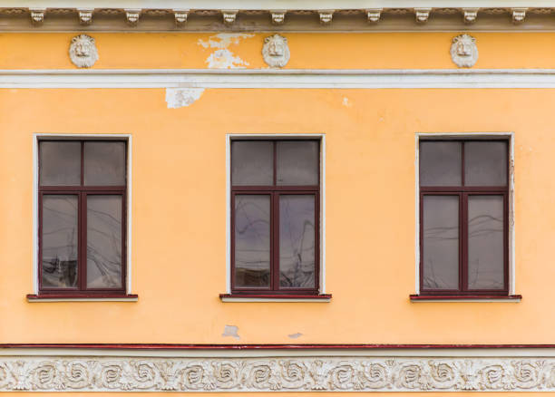 istock Windows in row on facade of historic building 1393103084
