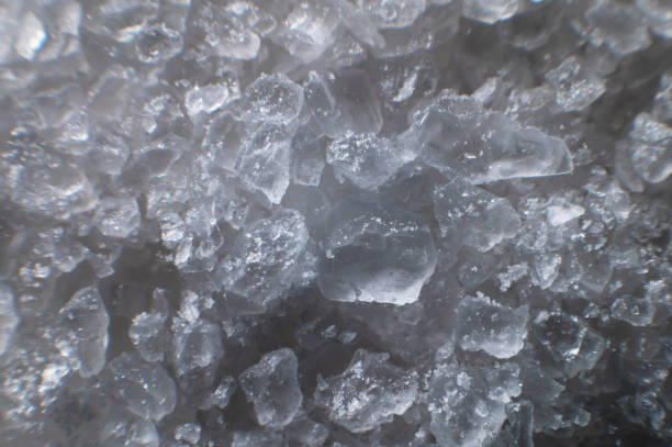 istock Coarse white iodized salt. Detailed background texture Macro close-up. Salt crystals of different sizes 1393104067