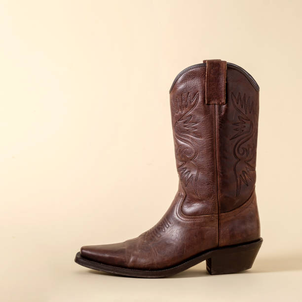istock Boot cowboy shoe texas america minimal rodeo ranger concept. 1393104465