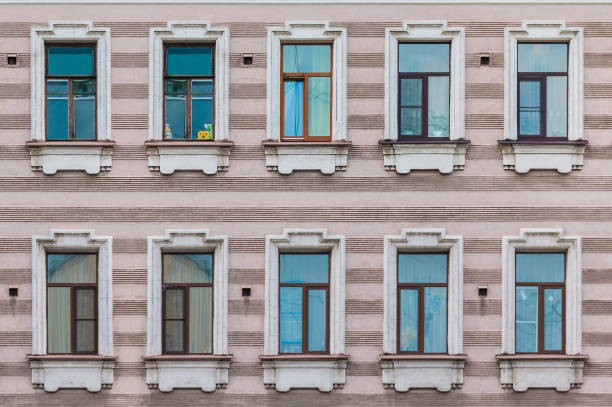 istock Windows in row on facade of historic building 1393104526