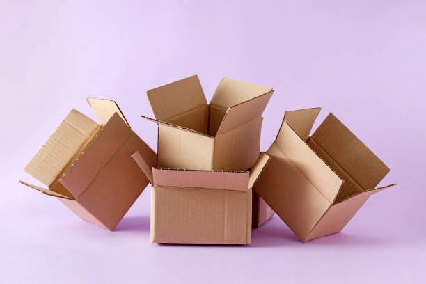 istock Pile of open cardboard boxes for storing and shipping items and parcels. 1393105475