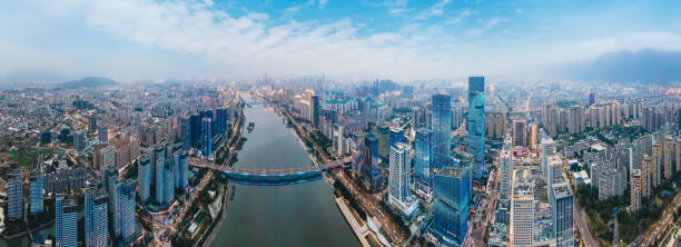 vista notturna di fotografia aerea dell'edificio centrale del centro commerciale sulla riva nord del fiume minjiang a fuzhou - fuzhou foto e immagini stock