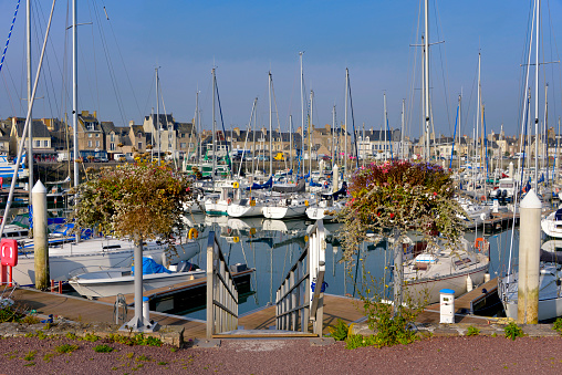 Port of Saint-Vaast-la-Hougue with two flowerpots, a commune in the peninsula of Cotentin in the Manche department in Lower Normandy in north-western France