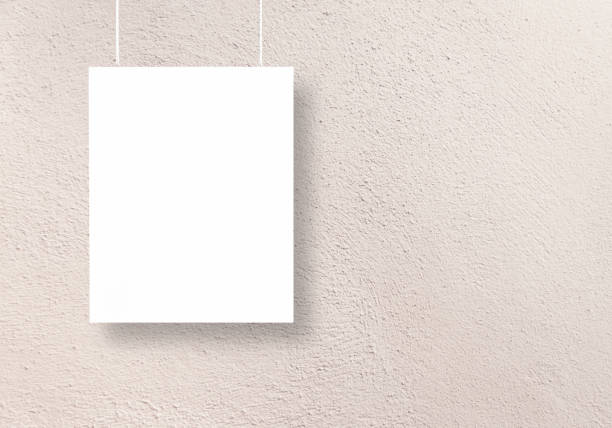 istock blank picture hanging on a stuccoed wall 1393112900