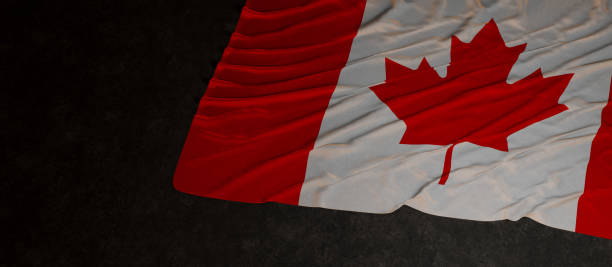 istock Canadian flag on dark background banner 3d Rendering 1393113163