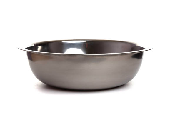 kitchen polished metal bowl isolated on white background.