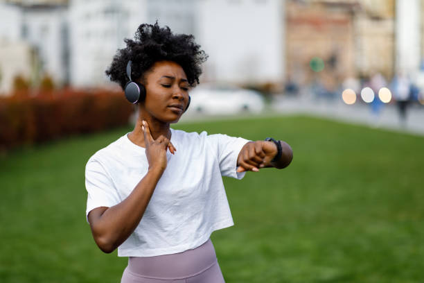 istock An African Woman is Checking his Heart Rate After a Training. 1393114008