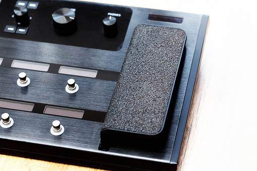 Guitar effects processor with built-in foot pedal.