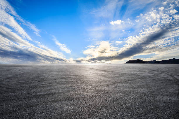 istock Asphalt road and beautiful sky clouds at sunrise 1393116341