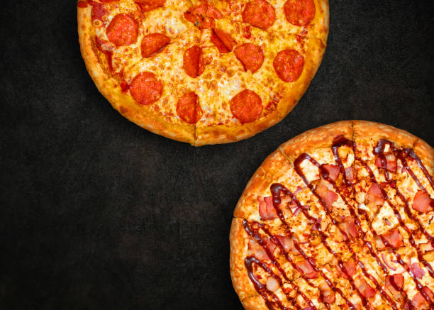 istock Delicious fresh pizza on dark background 1393116771