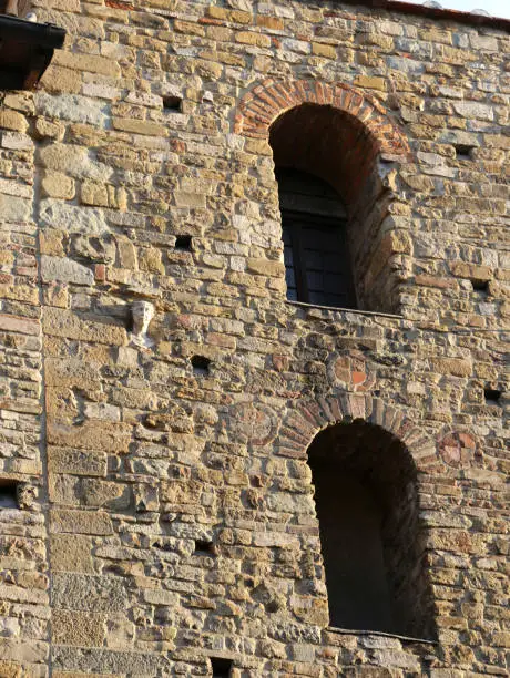 statue with the face of a woman named BERTA on the wall of the ancient house which is a reminder of an ancient Florentine legend of a petrified girl in Florence in Italy