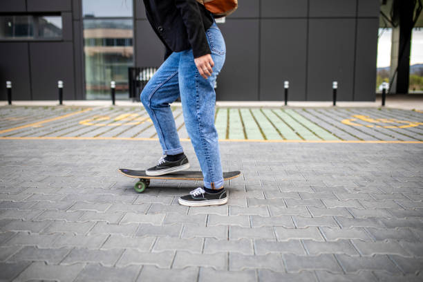 POV angle looking down at board and sidewalk
