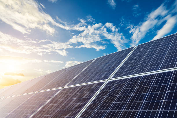 istock Solar panels and beautiful sunset clouds 1393121881